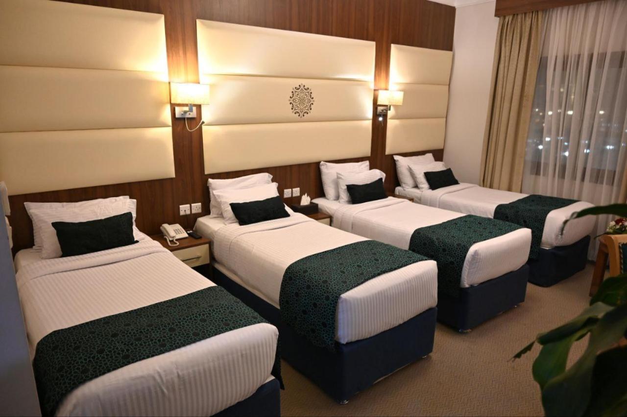 One Inn Hotel Medina Esterno foto